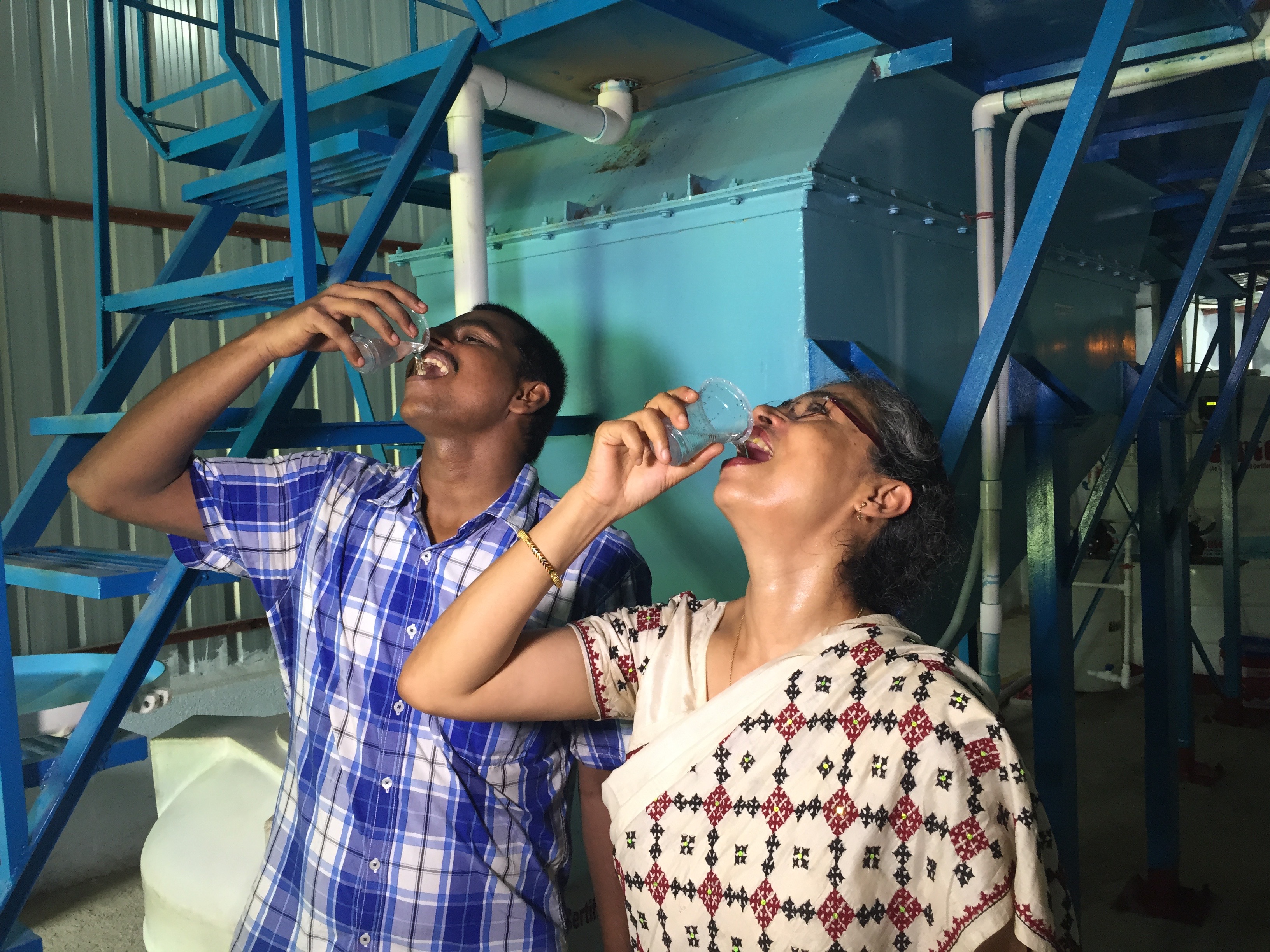 Tasting water treated by ECAR in India